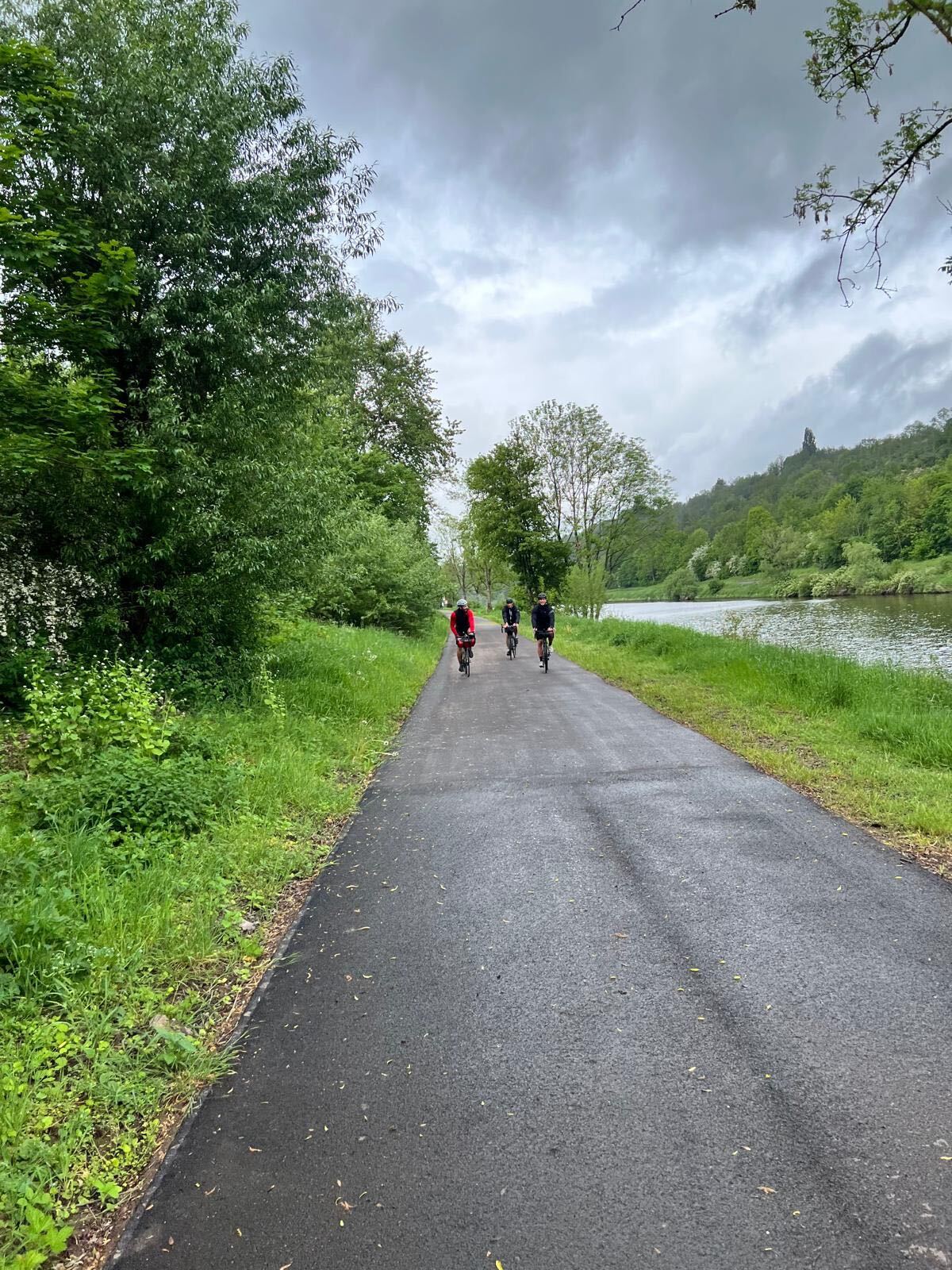 Riders rolling along the Moselle riverside path